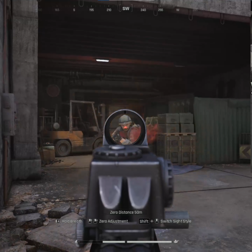 Player aims through a rifle scope at an enemy in a dim warehouse, with a minimap and colored markers on the right area of the screen.